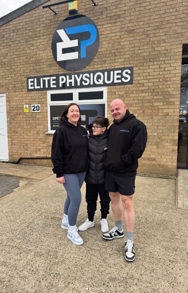 Dave and Anni, owners of Elite Physiques, outside the gym in Lowestoft with their son
